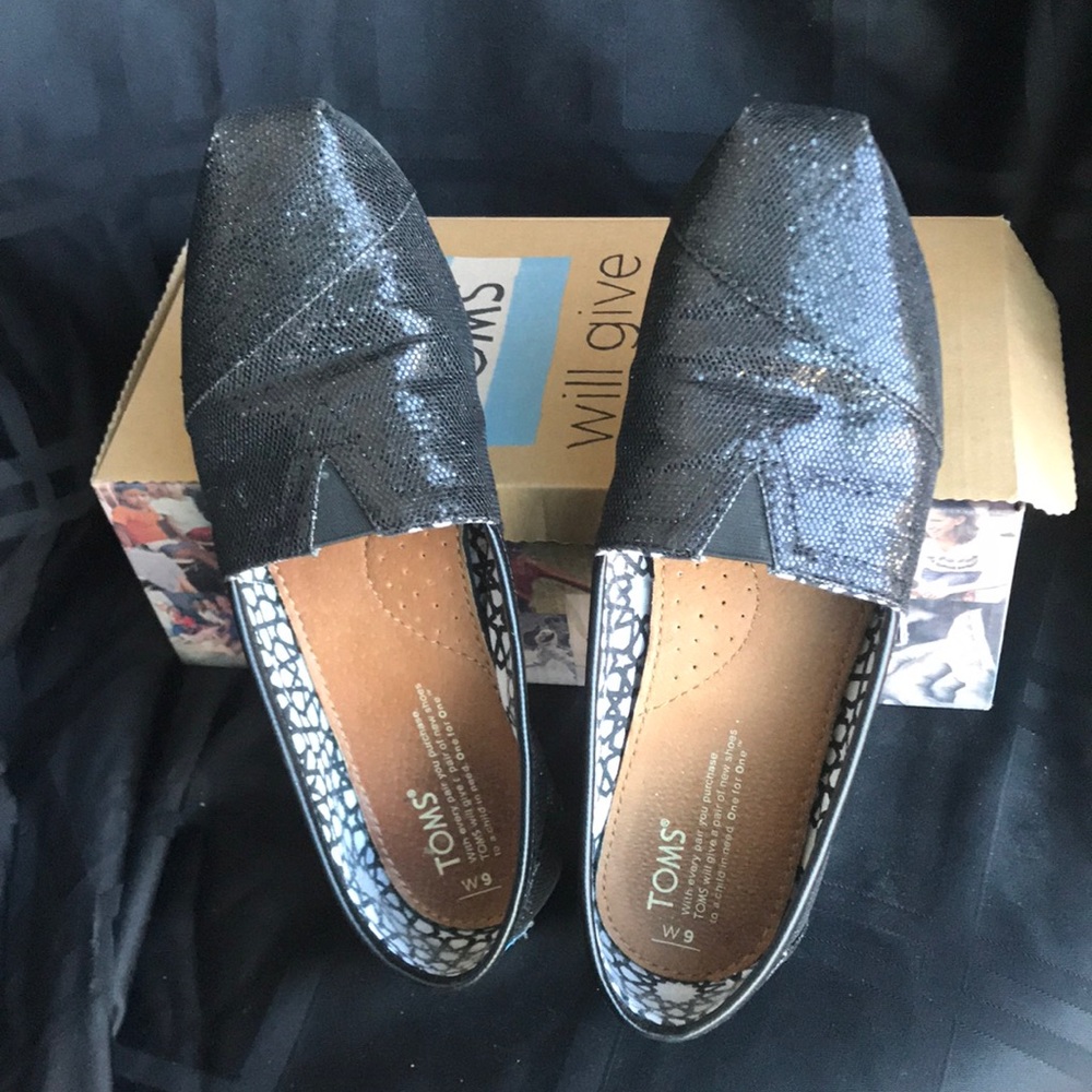 Tom’s Classic Black Glitter Slip-on.